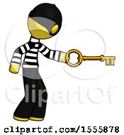 Yellow Thief Man With Big Key Of Gold Opening Something