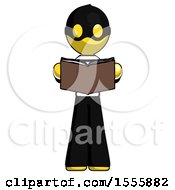 Poster, Art Print Of Yellow Thief Man Reading Book While Standing Up Facing Viewer