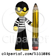 Yellow Thief Man With Large Pencil Standing Ready To Write