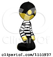 Yellow Thief Man Kneeling Angle View Right