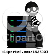 Poster, Art Print Of White Thief Man Resting Against Server Rack Viewed At Angle