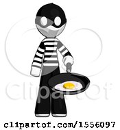 White Thief Man Frying Egg In Pan Or Wok