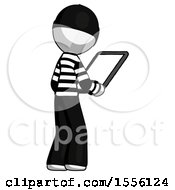 Poster, Art Print Of White Thief Man Looking At Tablet Device Computer Facing Away