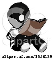 Poster, Art Print Of White Thief Man Reading Book While Sitting Down