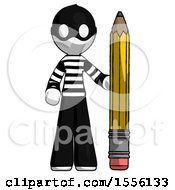 White Thief Man With Large Pencil Standing Ready To Write