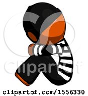 Poster, Art Print Of Orange Thief Man Sitting With Head Down Facing Sideways Left