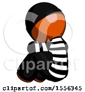 Poster, Art Print Of Orange Thief Man Sitting With Head Down Back View Facing Left