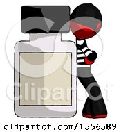 Red Thief Man Leaning Against Large Medicine Bottle