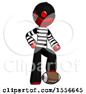 Poster, Art Print Of Red Thief Man Standing With Foot On Football