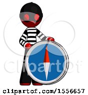 Poster, Art Print Of Red Thief Man Standing Beside Large Compass