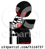 Poster, Art Print Of Red Thief Man Using Laptop Computer While Sitting In Chair Angled Right