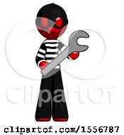 Red Thief Man Holding Large Wrench With Both Hands