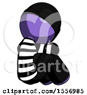 Purple Thief Man Sitting With Head Down Back View Facing Right
