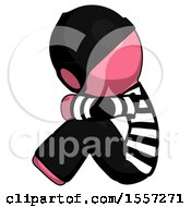 Poster, Art Print Of Pink Thief Man Sitting With Head Down Facing Sideways Left