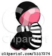 Poster, Art Print Of Pink Thief Man Sitting With Head Down Back View Facing Left