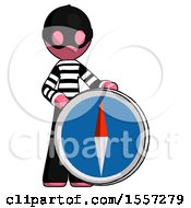 Poster, Art Print Of Pink Thief Man Standing Beside Large Compass