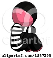 Poster, Art Print Of Pink Thief Man Sitting With Head Down Back View Facing Right