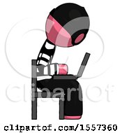 Pink Thief Man Using Laptop Computer While Sitting In Chair View From Side