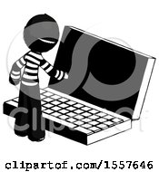 Ink Thief Man Using Large Laptop Computer