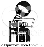 Ink Thief Man Using Laptop Computer While Sitting In Chair View From Back