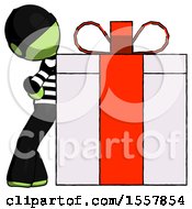 Poster, Art Print Of Green Thief Man Gift Concept - Leaning Against Large Present