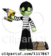 Green Thief Man Holding Drill Ready To Work Toolchest And Tools To Right