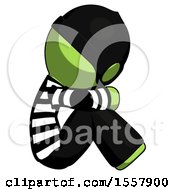 Poster, Art Print Of Green Thief Man Sitting With Head Down Facing Sideways Right