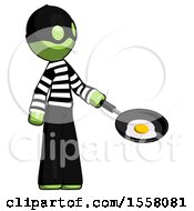 Green Thief Man Frying Egg In Pan Or Wok Facing Right