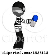 Gray Thief Man Holding Blue Pill Walking To Right