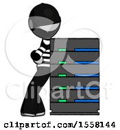 Poster, Art Print Of Gray Thief Man Resting Against Server Rack