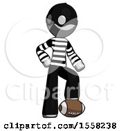 Gray Thief Man Standing With Foot On Football