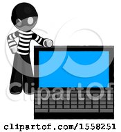Poster, Art Print Of Gray Thief Man Beside Large Laptop Computer Leaning Against It