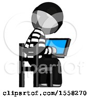 Poster, Art Print Of Gray Thief Man Using Laptop Computer While Sitting In Chair View From Back