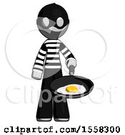 Gray Thief Man Frying Egg In Pan Or Wok