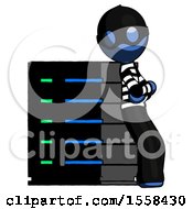 Poster, Art Print Of Blue Thief Man Resting Against Server Rack Viewed At Angle