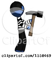 Poster, Art Print Of Blue Thief Man Hammering Something On The Right