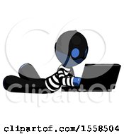 Blue Thief Man Using Laptop Computer While Lying On Floor Side Angled View