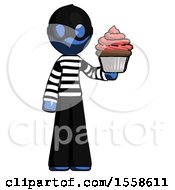 Blue Thief Man Presenting Pink Cupcake To Viewer