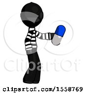 Black Thief Man Holding Blue Pill Walking To Right