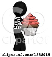 Poster, Art Print Of Black Thief Man Holding Large Cupcake Ready To Eat Or Serve