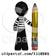 Black Thief Man With Large Pencil Standing Ready To Write