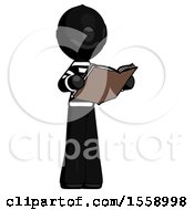 Black Thief Man Reading Book While Standing Up Facing Away