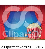 Popcorn Bucket Mascot On A Stage Over Blue