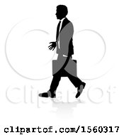 Clipart Of A Silhouetted Business Man Walking With A Reflection Or Shadow Royalty Free Vector Illustration