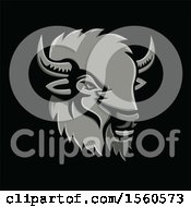 Clipart Of A Metallic Styled American Bison Mascot On A Black Background Royalty Free Vector Illustration