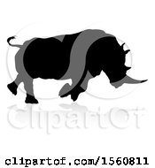 Clipart Of A Silhouetted Charging Rhino With A Shadow On A White Background Royalty Free Vector Illustration