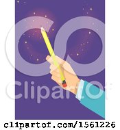 Hand Holding Up A Pencil With Magic Flares