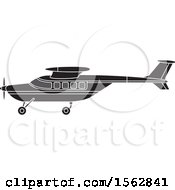 Clipart Of A Silhouetted Airplane With A Propeller Royalty Free Vector Illustration