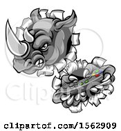 Clipart Of A Tough Rhino Monster Mascot Holding A Video Game Controller And Breaking Through A Wall Royalty Free Vector Illustration