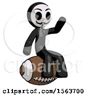 Black Little Anarchist Hacker Man Sitting On Giant Football